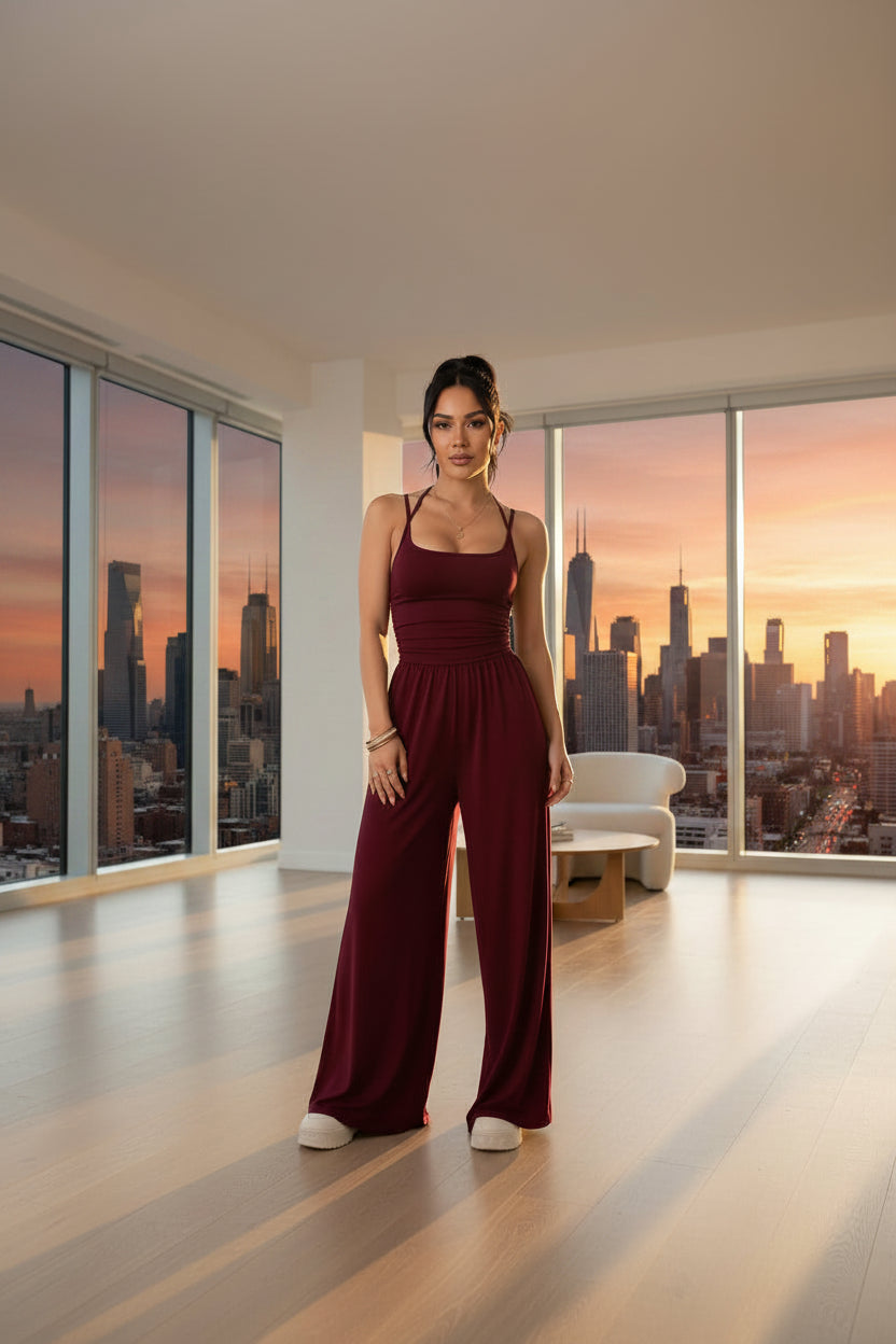 Dames Zwarte Jumpsuit – Geplooid Design met Halterhals en Wijde Pijpen
