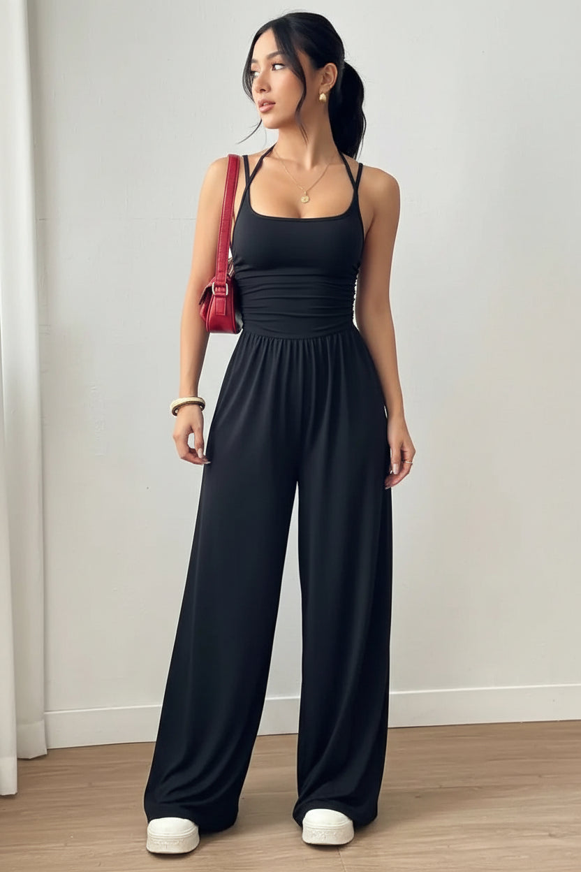 Dames Zwarte Jumpsuit – Geplooid Design met Halterhals en Wijde Pijpen
