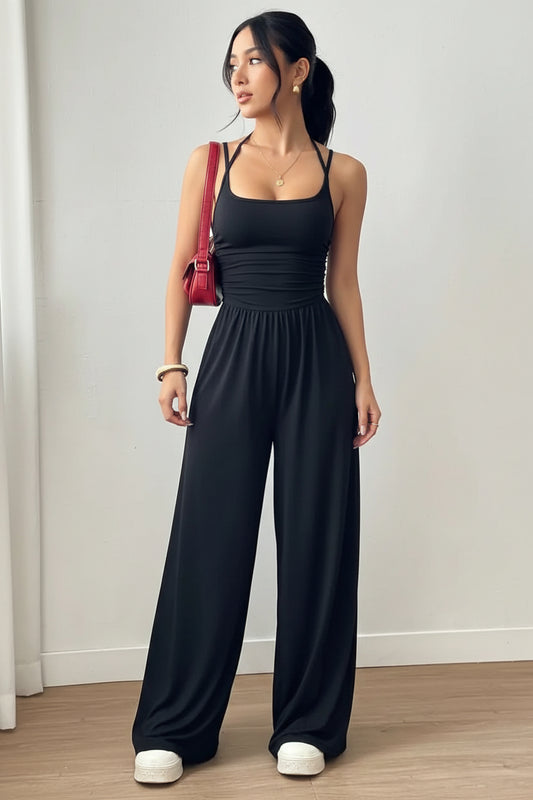 Dames Zwarte Jumpsuit – Geplooid Design met Halterhals en Wijde Pijpen